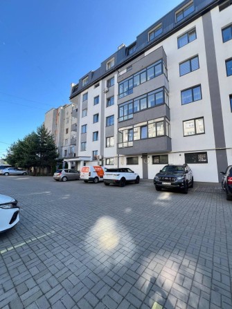 Продається сучасна двохрівнева квартира у місті Пустомити - фото 1