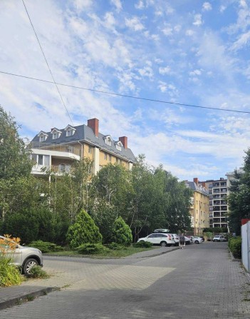 Продаж дворівневої квартири з просторою терасою - фото 1