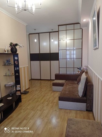 Продам 1к.в с ремонтом и мебелью,ул. Театральная д.5, 6/10,39900т.у.е. - фото 1