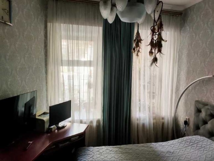 Продам 2-х комнатную квартиру в центре - фото 1