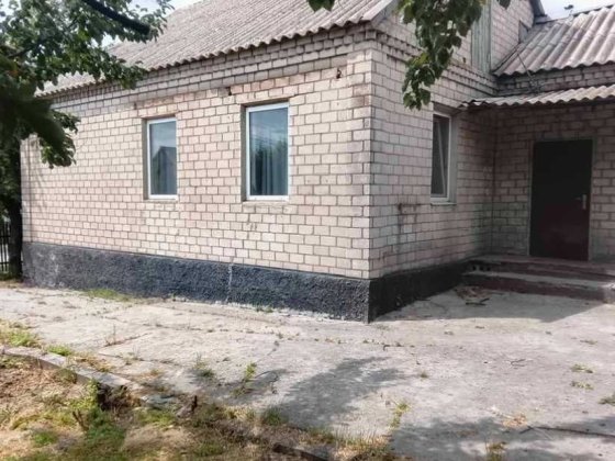 Продам кирпичный Дом на поселке  Строителей в городе Каменское. Кам'янське