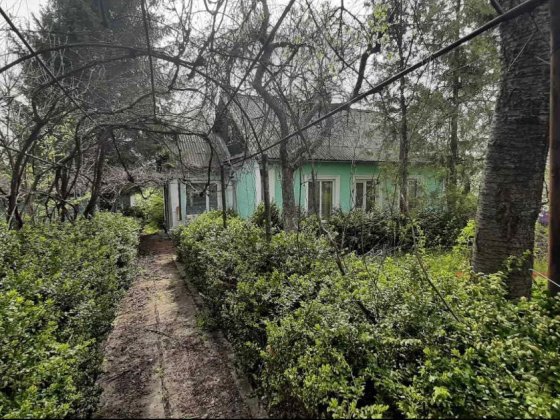 Ексклюзивна земельна ділянка з будинком у центрі міста Кам'янець-Подільський