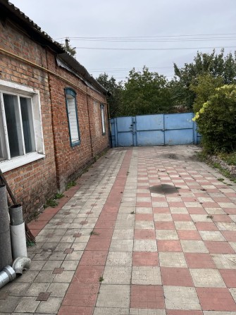 Продам 1/2 дома в г. Чугуев( Осиновка) - фото 1