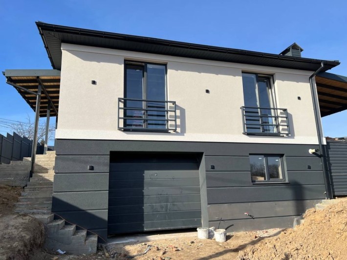 Будинок з гаражем від забудовника поруч з озером - фото 1