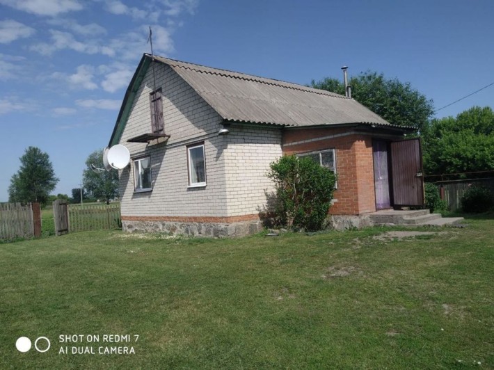 Продається домогосподарство в селищі Котельва - фото 1