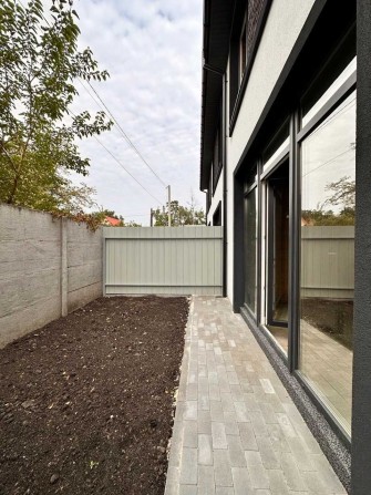 Центр Ірпеня, затишок і практичність 90 м² із двориком і паркомісцем - фото 1