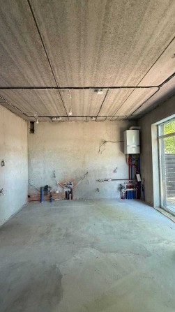 Таунхаус з ремонтом (під чистове оздоблення) в Ірпені. - фото 1