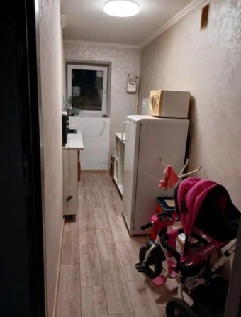 Продам выделенную комнату в коммуне, возле моря. - фото 1