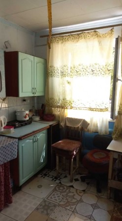 Комната в коммуне на ул. Николая Боровского - фото 1