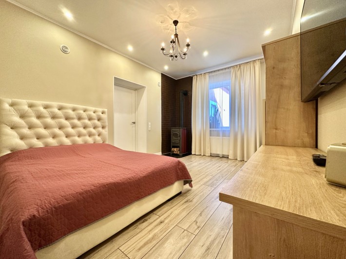 Ірпінь. Частина будинку біля лісу. Стильно, з ремонтом і каміном - фото 1