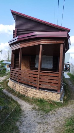 Дачний будиночок на причалі - фото 1