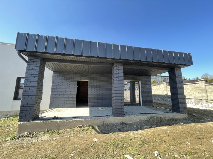 Американка з гаражем та міськими комунікаціями - фото 1