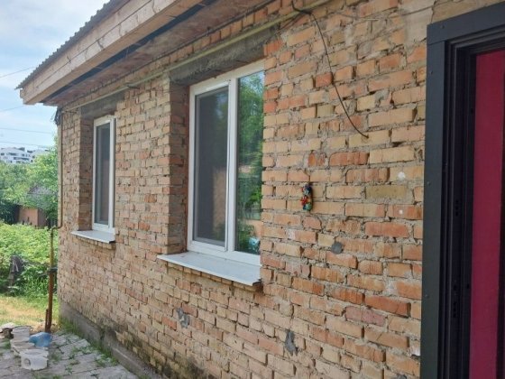 Продам 1/2 будинку  центр міста Рівне