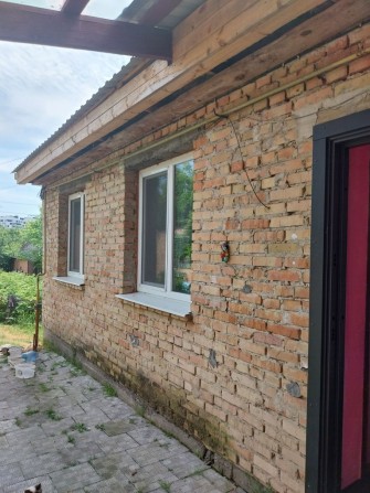 Продам 1/2 будинку  центр міста - фото 1