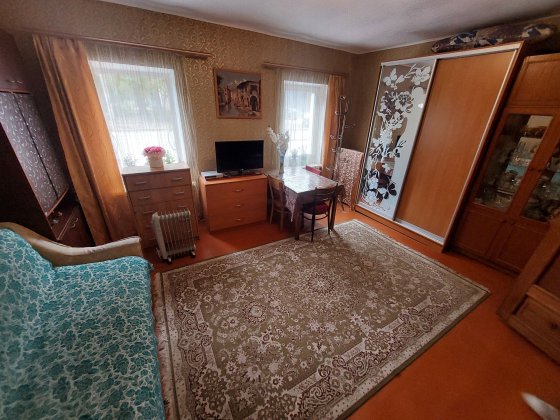 Частина будинку в центрі міста+ ділянка під забудову Житомир