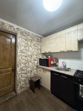 Продам половину будинку на Новомиколаївці - фото 1