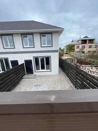 Сучасний двоповерховий дім із власною ділянкою | 60 м² - фото 1