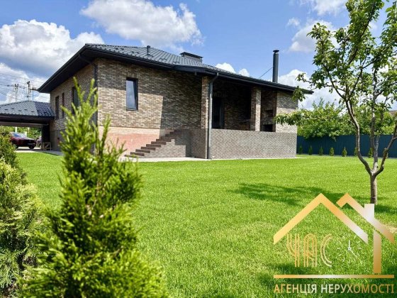 Продаж будинку 228м² з цокольним поверхом, гаражем, навісом та терасою Петропавлівська Борщагівка