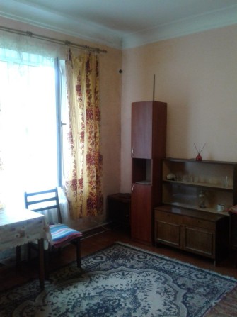 Сдам комнату на первом этаже, бульвар Шевченко. - фото 1