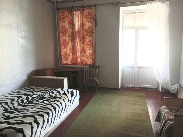 Сдам 1 комнату в коммуне со своей кухней в Центре - фото 1