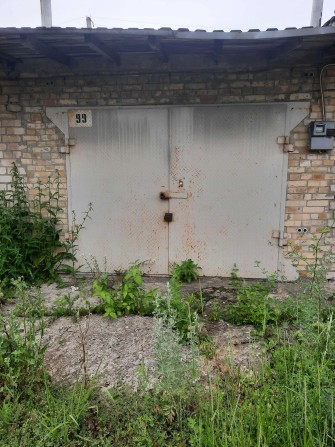 Продажа кирпичного гаража в обществе Буран. - фото 1