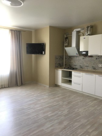 Большая 1к.кв  с индивидуальным отоплением - фото 1