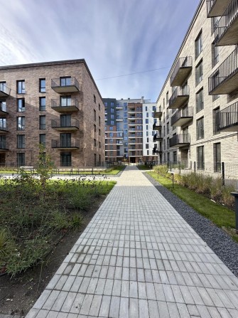 Продам 2-кімнатну квартируз патіо в новобудові - фото 1