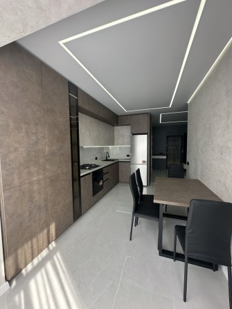 1,5 кімнатна у центрі з сучасним ремонтом - фото 1