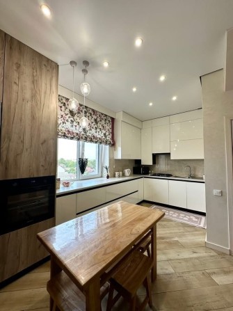 Продаж дворівневої квартири з новеньким дизайнерським ремонтом - фото 1