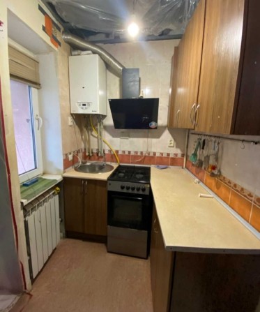 Продам квартиру в приватному секторі по вулиці Патріарха Мстислава - фото 1