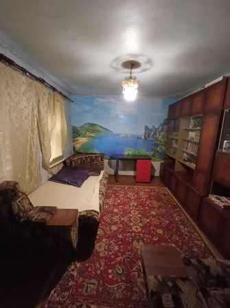 Сдам в центре г. Мерефы ЧАСТЬ дома. - фото 1