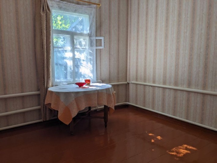 Продається 1/2 дому з окремим входом і ділянкою - фото 1