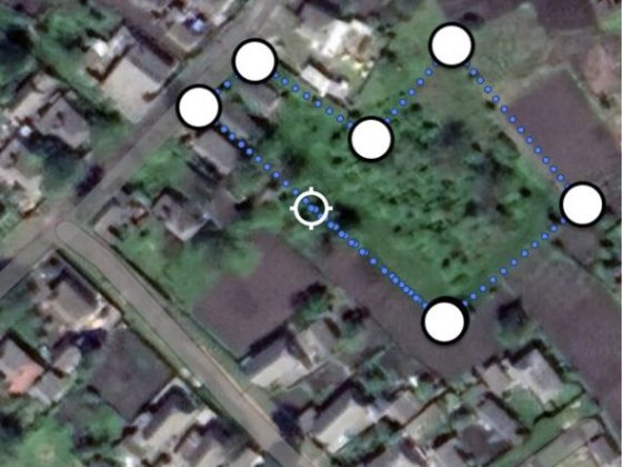 Земельна ділянка з будинком та гаражем Ромны