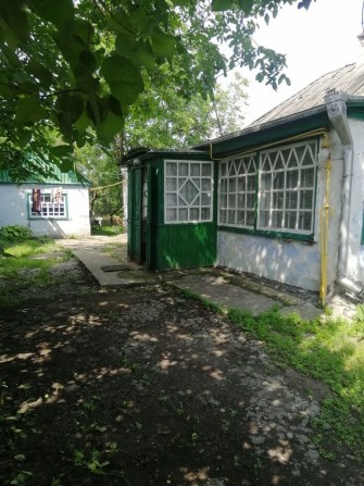 Продам дом в городе Новомосковск. Вороновка, район магазина Оксамита. - фото 1