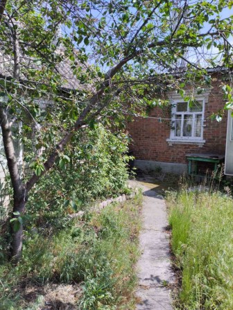 В продаже 1 часть дома. Центр города. - фото 1