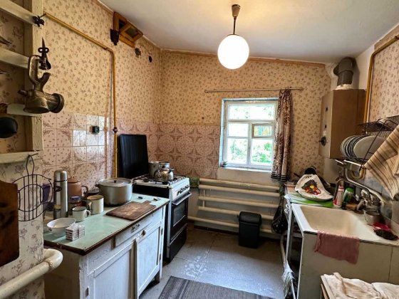 Продаж 3к житлового будинку (половина) в Центрі міста 33702 Хмельницький