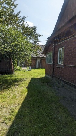 Будинок по вулиці торгова 61 - фото 1