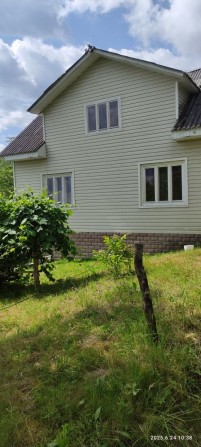 Будинок та земельна ділянка - фото 1