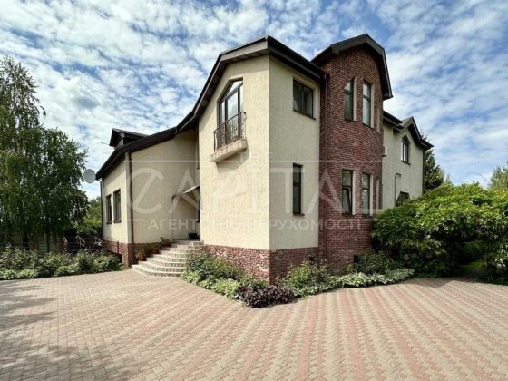 Будинок з бомбосховищем та гаражем в Козині/Конча-Заспа/ Козин