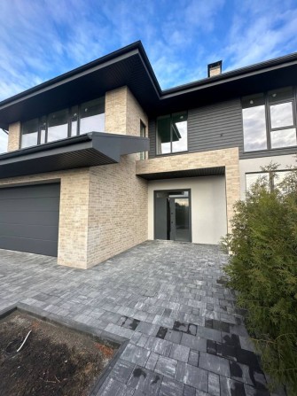 Продаж сучасного будинку в закритому котеджному містечку - фото 1