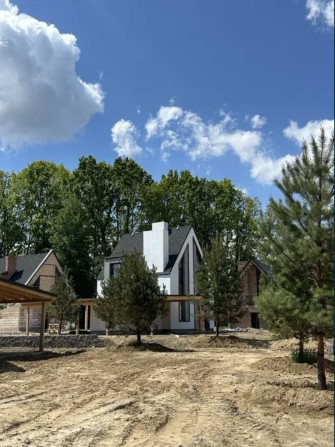 Кирпичный дом в скандинавском стиле в закрытом коттеджном городке - фото 1