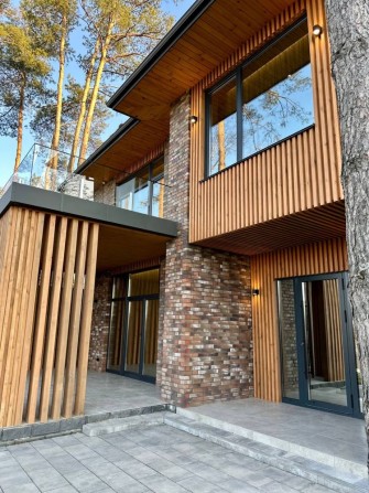 Сучасний будинок з дизайнерським РЕМОНТОМ та підземним паркінгом - фото 1