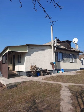 Гарний будинок в центрі Нових Санжар - фото 1