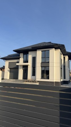 Новий будинок біля міста - фото 1