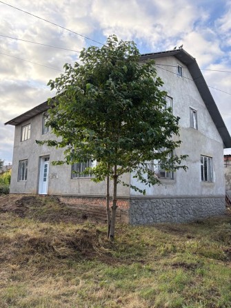 Двоповерховий будинок з гаражем та літньою кухнею Кіцмань - фото 1