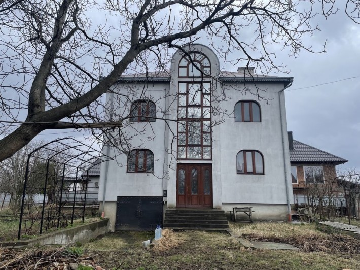 Будинок з прилеглою земельною ділянкою - фото 1