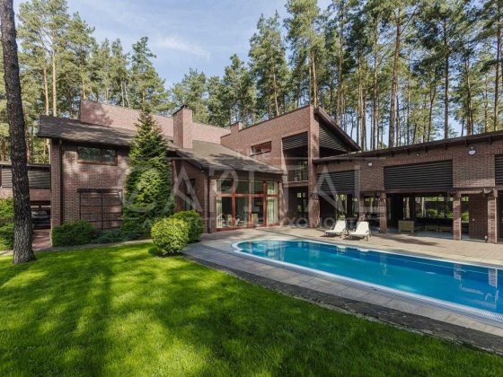 Продам дизайнерский дом в 500м2 в Буче. Ирпень. Закрытый КГ. Бассейн. Буча