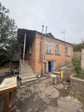 Добротний будинок в центрі міста - фото 1