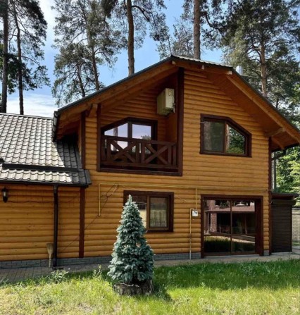 Цегляний будинок з підвалом та басейном на 10 сотках - фото 1