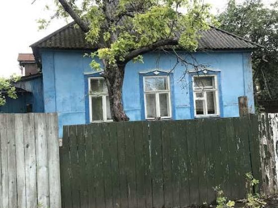 Земельна ділянка з будинком Суми